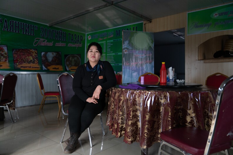 Batdelger Genden, 53, at her recently opened restaurant in Tsagaan Khad. She calls this region "Mongolia's Korea," saying, "This is like the promised land for the Mongolian unemployed, for those who want to make money for honest work."