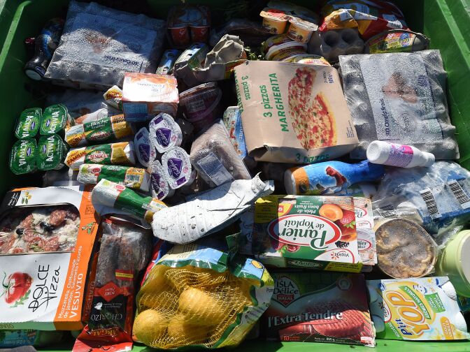 A picture taken on November 5, 2015 shows food waste in a plastic container before been crushed and transformed in a cooperative recycling site in Belesta-en-Lauragais.