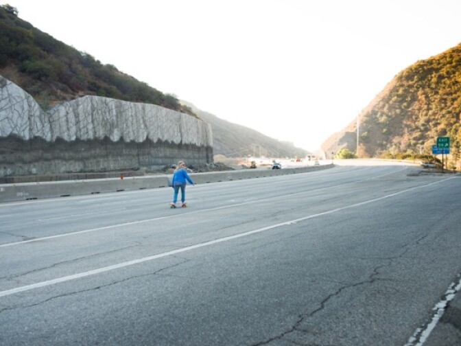 Skateboarder Cindy Whitehead breezes down the 405 Freeway during Carmageddon II.