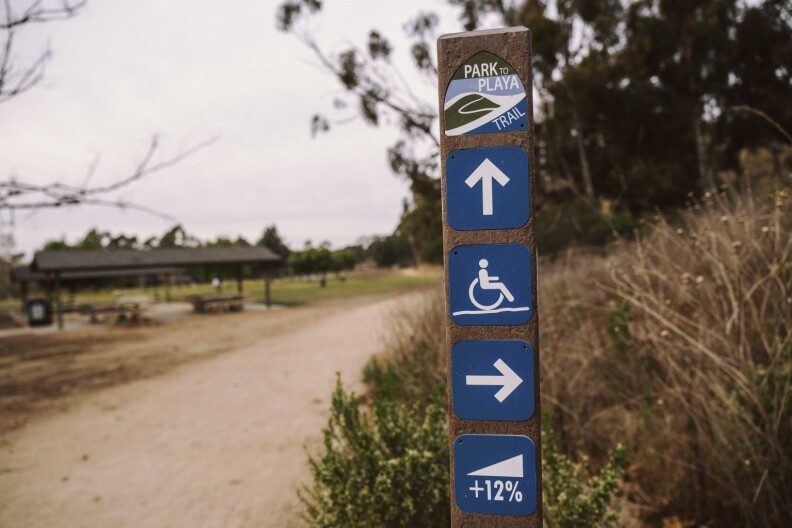 A trail marker along Park to Playa directs hikers in the right direction.