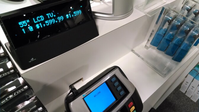 FILE: A cash register shows the purchase of an LCD screen TV. Residents in some L.A. County cities could be paying up to 10.5 percent sales tax on items if a ballot measure to fund transit is approved.