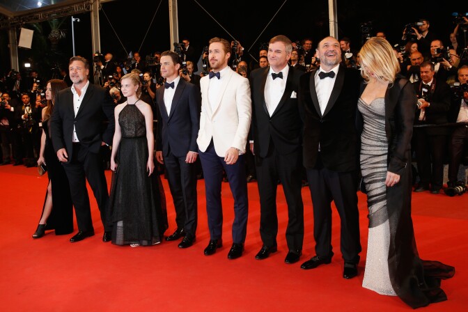 CANNES, FRANCE - MAY 15:   Actress Murielle Telio, Actor Russell Crowe, actress Angourie Rice, actor Matt Bomer, actor Ryan Gosling, director Shane Black, Producer Joel Silver and his wife attend "The Nice Guys" premiere during the 69th annual Cannes Film Festival at the Palais des Festivals on May 15, 2016 in Cannes, France.  (Photo by Tristan Fewings/Getty Images)