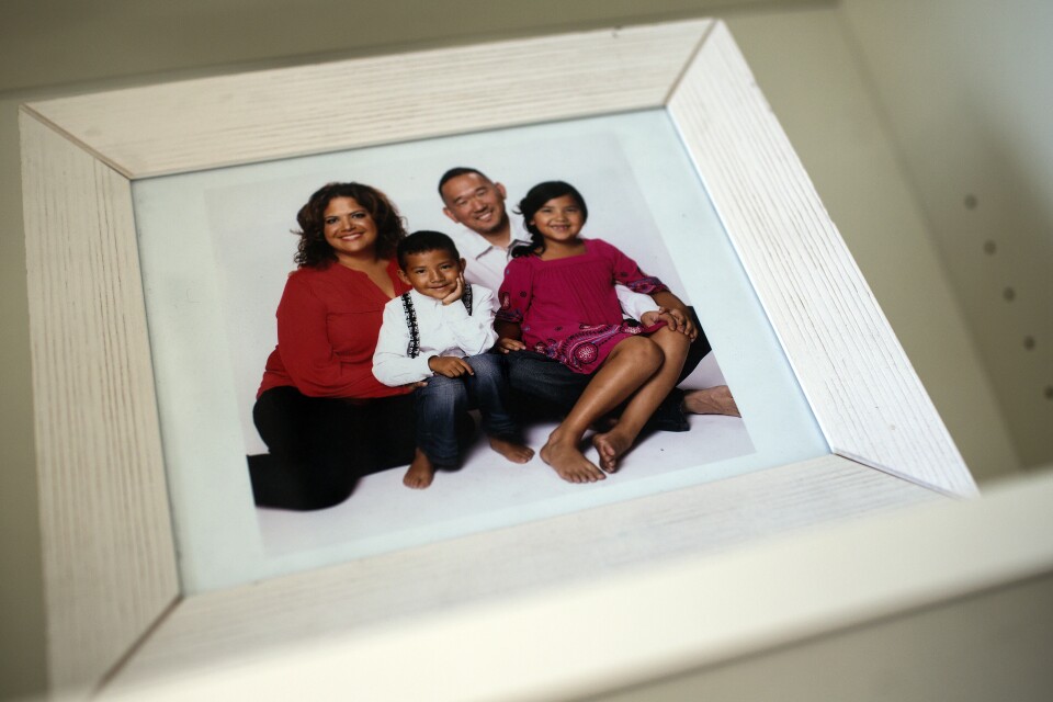 A photograph of Sonia Smith-Kang, her husband and their two youngest children is on display inside her downtown Los Angles workspace.
