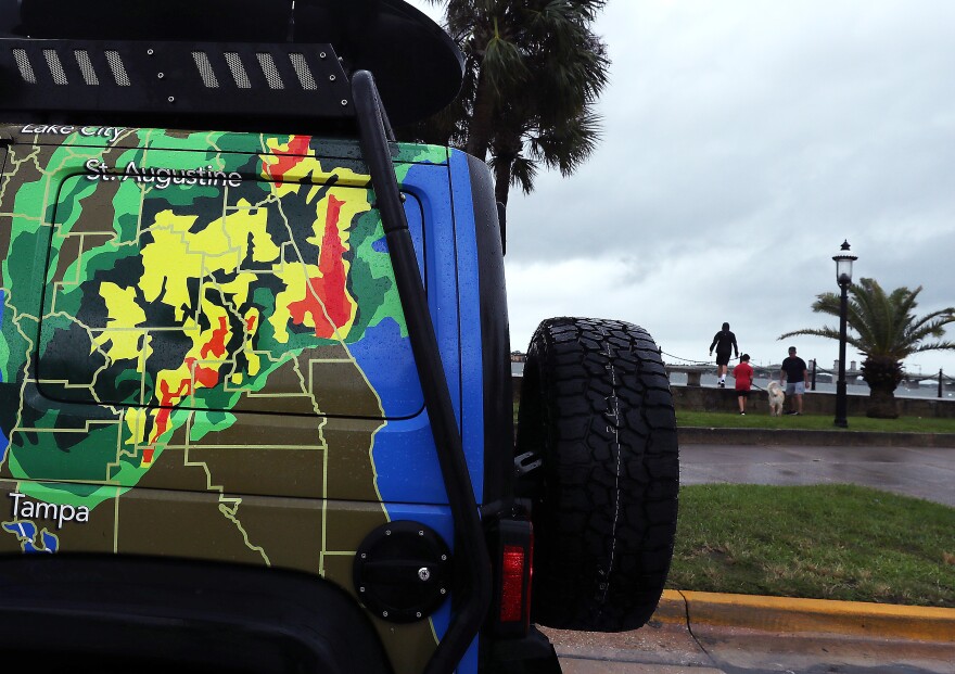 ST. AUGUSTINE, FLORIDA  - SEPTEMBER 04: People look out over the water after Hurricane Dorian passed through the area, on September 4, 2019 in St. Augustine, Florida. The slow-moving Dorian, which has been downgraded to a Category 2 storm, is drenching Florida with heavy rain and strong winds as it moves north parallel to the coastline towards the Carolinas. (Photo by Mark Wilson/Getty Images)