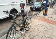 A bike locked to a parking meter illegally in Westwood Village. A new plan from the city to install hitches on meters could make this kind of bike parking legal.