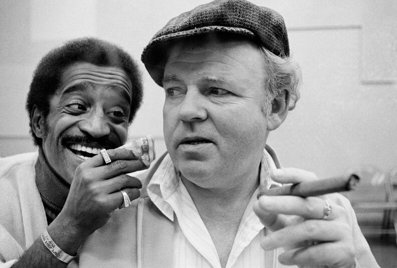 Entertainer Sammy Davis, Jr., is shown with actor Carroll O'Connor during rehearsals for an upcoming episode of the comedy series &quot;All In The Family,&quot; Feb. 18, 1972 in Los Angeles.  In this episode, Archie, played by O'Connor, is moonlighting as a cabbie when he picks up Sammy Davis Jr., who plays himself.  (AP Photo)