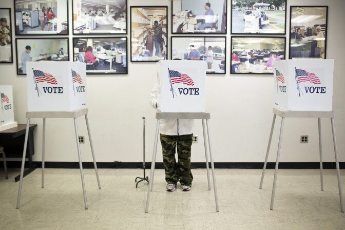 Voters vote early at the Los Angeles County Registrar/Recorder building in Norwalk on Friday, Oct. 17. Early voting will also take place the two weekends leading up to election day on Nov. 4.