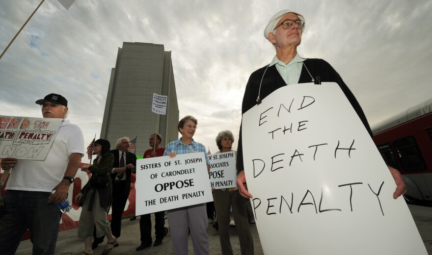 Anti-death penalty campaigners stage a demonstration and march outside the Federal Bulding in Los Angeles on September 28, 2010.  Anti-death penalty campaigners slammed California's bid to resume executions this week after a five-year hiatus, as a killer's fate remained uncertain amid a shortage of a key drug. Albert Greenwood Brown, convicted of the 1980 abduction and rape of a 15-year-old schoolgirl, is scheduled to die at 9:00 pm Thursday (0400 GMT Friday) after a legal delay ordered by Governor Arnold Schwarzenegger. But the execution, due to take place at San Quentin prison, north of San Francisco, is also in doubt as it would come hours before the expiration date of the jail's remaining stock of a key lethal drug used in the death chamber.