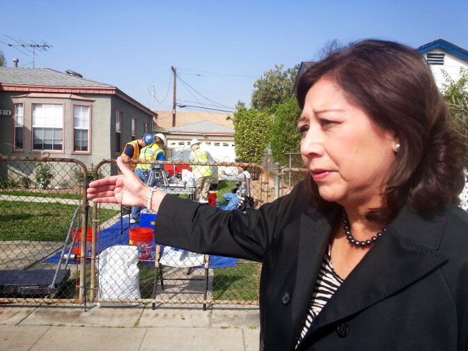Los Angeles County Supervisor Hilda Solis visits work crews testing soil in Commerce for lead contamination from the former Exide battery recycling plant in nearby Vernon.