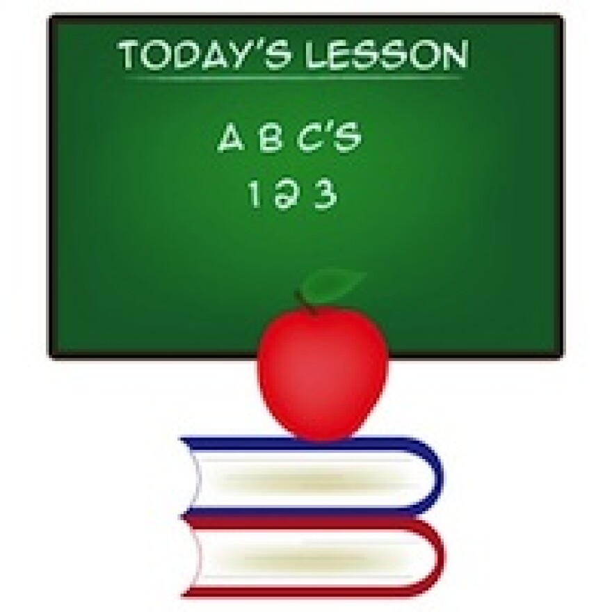 chalkboard_with_a_stack_of_school_books.jpg