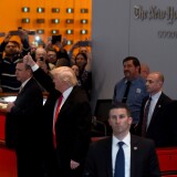 US President-elect  Donald Trump  waves to the crowd after leaving a meeting at the New York Times on November 22, 2016 in New York.
US President-elect Trump said Tuesday he has an open-mind about pulling out of world climate accords and admitted global warming may be in some way linked to human activity."I think there is some connectivity. Some, something. It depends on how much," he told a panel of New York Times journalists. 
 / AFP / TIMOTHY A. CLARY        (Photo credit should read TIMOTHY A. CLARY/AFP/Getty Images)