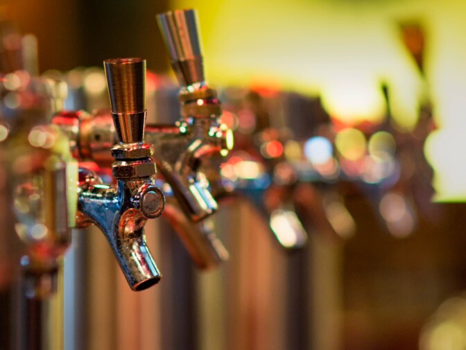 This row of beer taps at a local bar is no longer in use, retired in place, done with, over, dead, broken, no more, out of service, caput!  You get the idea - but the lineup and the bar lights reflecting within the row of taps made for an interesting photo op.