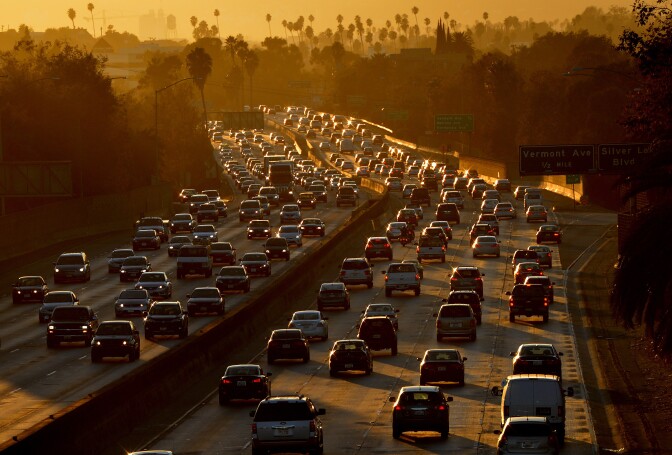 Heavy traffic clogs the 101 Freeway as people leave work for the Labor Day holiday in Los Angeles on Aug. 29, 2014. 