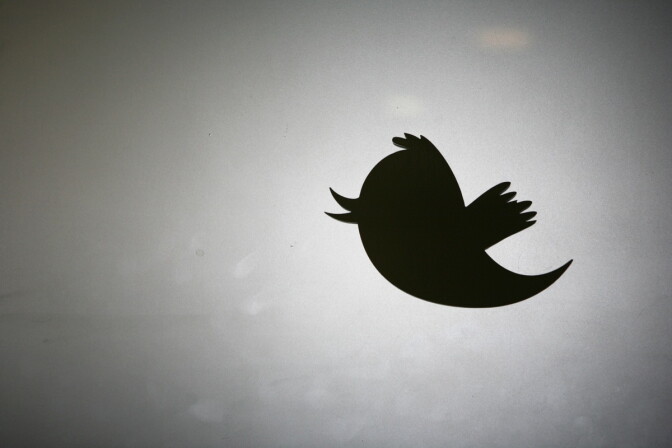 Twitter logo is displayed at the entrance of Twitter headquarters in San Francisco on March 11, 2011 in California.