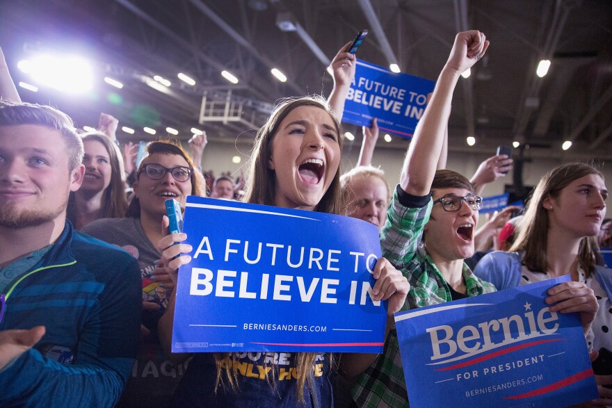 Supporters cheer as Democratic presidential candidate Senator Bernie Sanders (D-VT) arrives to speak at a campaign rally at the Alliant Energy Center on March 26, 2016 in Madison, Wisconsin.