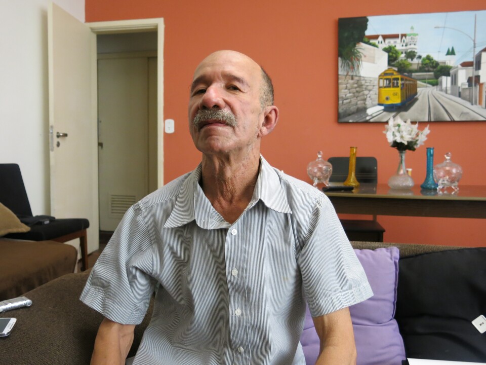 Red Commando founder William da Silva, known as "The Teacher," in his apartment in Rio. (Photo used by permission of author Ioan Grillo.)