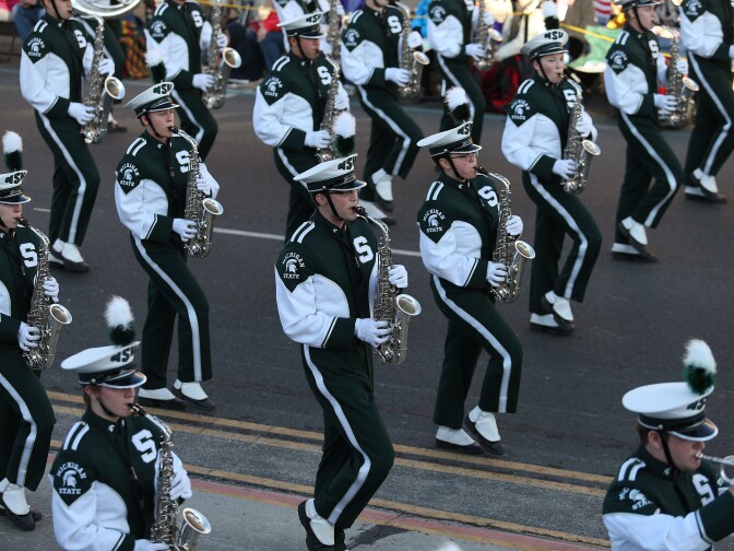 PASADENA, CA - JANUARY 01: The Michigan State University Marching Band  on the parade route during the 125th Rose Parade on January 1, 2014 in Pasadena, California.  (Photo by Frederick M. Brown/Getty Images)