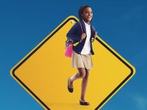 One of the Go Human ads depicts a human girl on a traffic sign to remind drivers of the human life at stake in collisions.