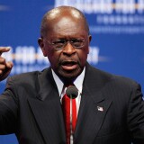 WASHINGTON, DC - NOVEMBER 04:  Republican presidential candidate and former Godfather's Pizza CEO Herman Cain addresses the Defending the American Dream Summit at the Washington Convention Center November 4, 2011 in Washington, DC. The conservative political summit is organized by Americans for Prosperity, which was founded with the support of brothers David H. Koch and Charles G. Koch of Koch Industries.  (Photo by Chip Somodevilla/Getty Images)