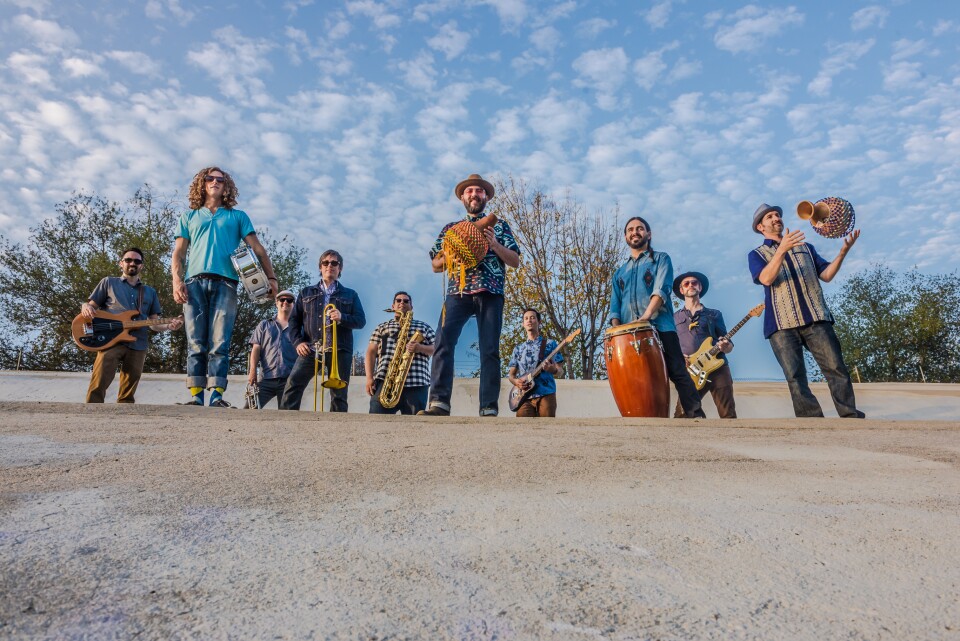 The ten piece band, Jungle Fire, describes themselves as "Tropi-funk."