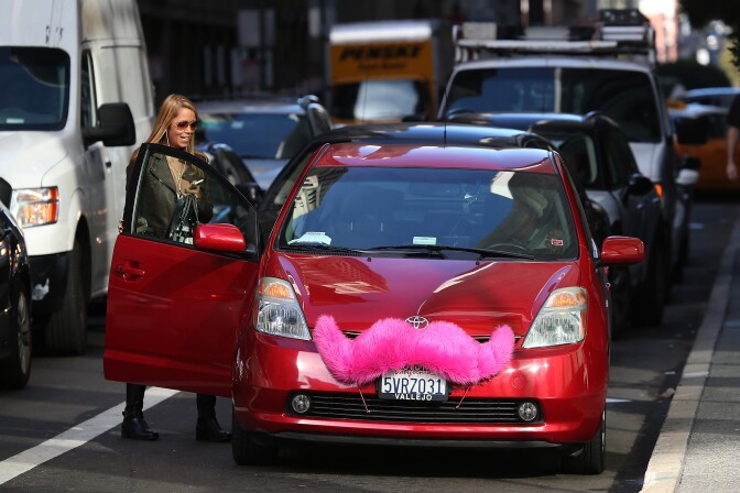 The California Public Utilities Commission is scheduled to vote on a proposal Thursday changing the insurance requirements for companies like Lyft.