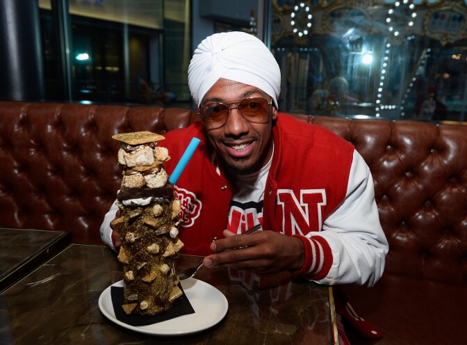 Actor and television personality Nick Cannon is presented the brand new "Insane Campfire Spiked S'mores Coffee Milkshake" at Sugar Factory American Brasserie on July 9, 2017 in Las Vegas, Nevada.