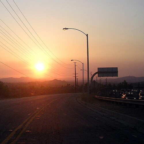 Stan Paul takes pictures as he rides along during his long commute from Riverside to UCLA.
