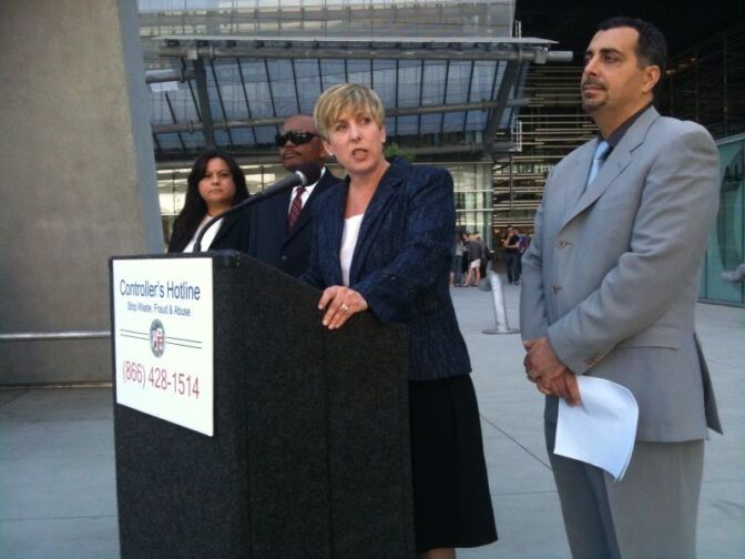 Los Angeles City Controller Wendy Greuel with Department of Transportation Interim General Manager Amir Sedadi. The two gave conflicting accounts of how the city may be missing out on collecting parking ticket fines.