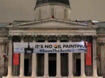 Norway has given 29 companies licenses to drill for oil and gas off its coast, mainly in the Arctic region. Greenpeace protesters scale the pillars of the National Gallery in central London, on February 21, 2012, as they unfurl a banner in protest at what they claim are Shell's plans for drilling oil in the Arctic region.