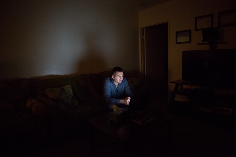 Tariq Abu Khumra talks with his family in Iraq over Skype at least three times a week.