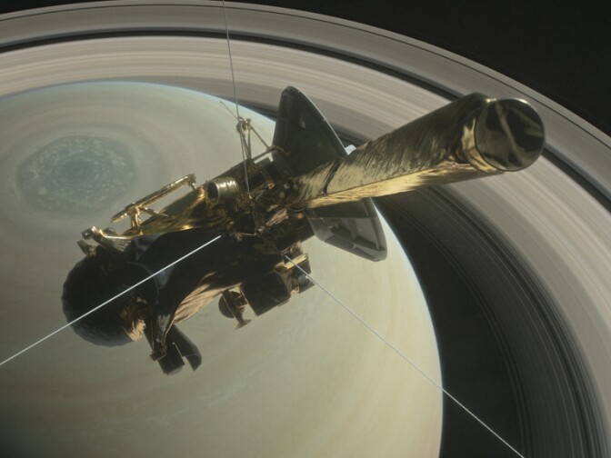NASA's Cassini spacecraft made its first dive between Saturn and its rings early Wednesday, as the final act in a nearly 20-year mission.