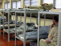 Mentally ill inmates who are able to shower, eat, sit quietly and otherwise care for themselves live in a special division in this jail. A psychologist is stationed right outside the room and officers are trained to deal with psychotic episodes.