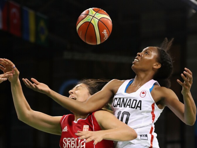 RIO DE JANEIRO, BRAZIL - AUGUST 08:  Nirra Fields #10 of Canada and Jelena Milovanovic #9 of Serbia battle for a loose ball during the women's basketball game on Day 3 of the Rio 2016 Olympic Games at the Youth Arena on August 8, 2016 in Rio de Janeiro, Brazil.  (Photo by Christian Petersen/Getty Images)