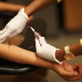 MIAMI, FL - MAY 12:  Peter Yanez, who is insured under a policy from the Affordable Care Act, has blood drawn by Linda Williams, a medical assistant, as he gets a blood test at a Planned Parenthood health center on May 12, 2017 in Miami, Florida. A GOP plan to repeal the Affordable Care Act would cut  federal funding for Planned Parenthood services at their health centers. Planned Parenthood has approximately 700 health centers across the country that serve 2,470,000 male and female patients and provide services for preventive health care, birth-control, cancer screeening, pregnancy tests and STD testing and treatment.  (Photo by Joe Raedle/Getty Images)