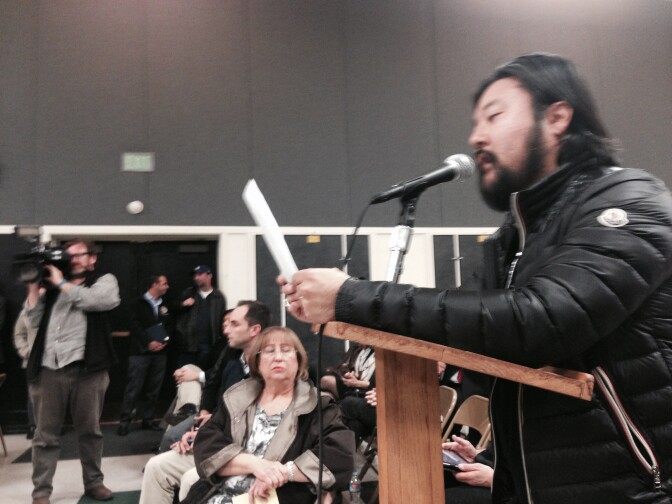 Eric Nam addresses members of the state Assembly Utilities and Commerce Committee at Granada Hills Charter High School Jan. 21, 2016. He lives near a natural gas leak that has led thousands of families to relocate away from Porter Ranch, Granada Hills and Chatsworth.