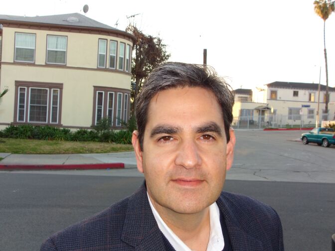 Jose Gardea, chief of staff to City Councilman Ed Reyes, is running to succeed his boss. He's on a freshly-paved street in the Pico-Union area.
