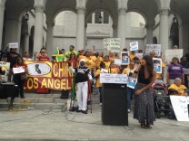 Street vendor advocates rally outside City Hall before a city Economic Development Committee meeting on possible plans to legalize street vending in Los Angeles. 
