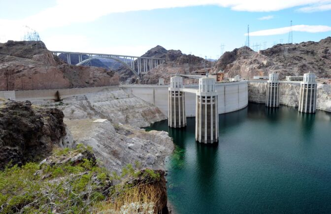  A general view of the Mike O'Callaghan-Pat Tillman Memorial Bridge part of the Hoover Dam Bypass Project is seen left of the Hoover Dam October 26, 2010 in the Lake Mead National Recreation Area, Arizona. The 1,900-foot-long structure sits 890 feet above the Colorado River, about a quarter of a mile downstream from the Hoover Dam. The USD 240 million four-lane bypass project to relieve vehicle traffic on the Hoover Dam began in 2003, and opened to traffic on October 19.  