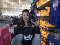 Crystal Liu of Alhambra waited at the team store at Dodger Stadium for the official World Series fitted hats to arrive.