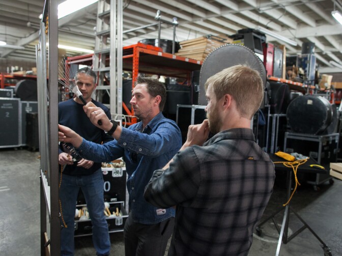 Composer Andrew Norman meets with LA Chamber Orchestra percussionists Wade Culbreath and Ted Atkatz on Friday, Jan 17, 2015 to go over instrumentation for his piece, "Frank's House,"  which is inspired by the works of Frank Gehry. The composition will debut in a performance on Feb. 5, 2015 and will incorporate sounds made from raw materials that Gehry uses in his buildings.