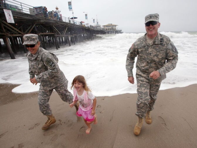 First Sergeant Tim McCoy, wife Amy, and daughter Sami in Santa Monica. This shoot was for HeartsAprart.org.  