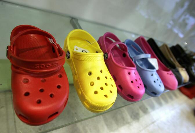New York, UNITED STATES: A sample of Crocs shoes on display in a midtown New York City shoe store 21 February 2007.  Crocs is an American company founded by Lyndon "Duke" Hanson, Scott Seamans, and George Boedecker in July 2002  in Boulder, Colorado. Originally intended as a boating/outdoor shoe because of its slip-resistant, non-marking sole, crocs introduced its first model, the Beach  at the Ft. Lauderdale Boat Show and has become one of the most trendy shoes in the United States. AFP PHOTO    Timothy A. CLARY (Photo credit should read TIMOTHY A. CLARY/AFP/Getty Images)