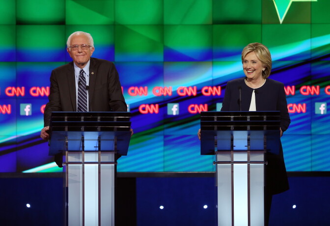 LAS VEGAS, NV - OCTOBER 13:  Democratic presidential candidates Sen. Bernie Sanders (I-VT) (L) and Hillary Clinton take part in a presidential debate sponsored by CNN and Facebook at Wynn Las Vegas on October 13, 2015 in Las Vegas, Nevada. Five Democratic presidential candidates are participating in the party's first presidential debate.  (Photo by Joe Raedle/Getty Images)