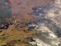 At least 100 homes have been evacauted in the hillside neighborhoods of Monrovia because of a brush fire that began Saturday morning and grew to consume about 150 acres of land. 