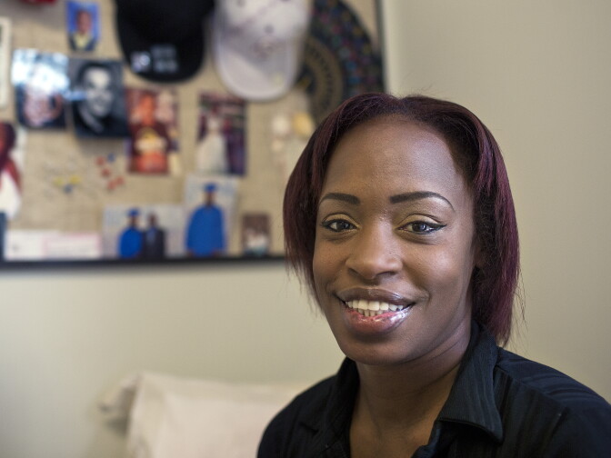 Los Angeles Mission student Alicia Warner sits in her bedroom at the mission on Tuesday, Dec. 16, 2014. Warner is set to graduate from the psychology program in February.