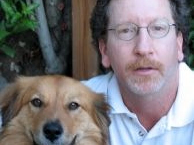 Sportswriter and Off-Ramp contributor David Davis (R), with Orly. 