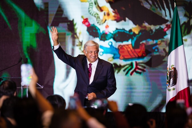 MEXICO CITY, MEXICO - JULY 01: Andres Manuel Lopez Obrador, salutes attendants after his virtual victory in the elections for the Presidency of Mexico in the Media Center at the Hilton Hotel on July 1, 2018 in Mexico City, Mexico. (Photo by Manuel Velasquez/Getty Images)