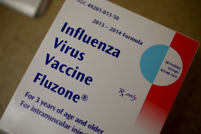 A box of influenza vaccine shots is seen in the MinuteClinic at the CVS/pharmacy on January 6, 2014 in Fort Lauderdale, Florida. The 2013-2014 influenza season is starting to take off in the United States, with more than half the country reporting widespread cases of flu activity, according to the US Centers for Disease Control and Prevention.   