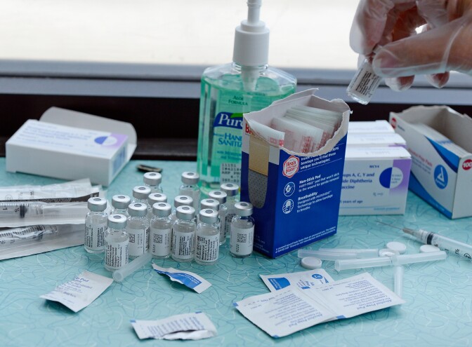 HOLLYWOOD, CA - APRIL 15:  People receive a free meningitis vaccine from Dr. Wayne Chen at the AIDS Healthcare Foundation pharmacy on April 15, 2013 in Hollywood, California. The AIDS Healthcare Foundation started free meningitis vaccines after a West Hollywood man died from the disease.  (Photo by Kevork Djansezian/Getty Images)