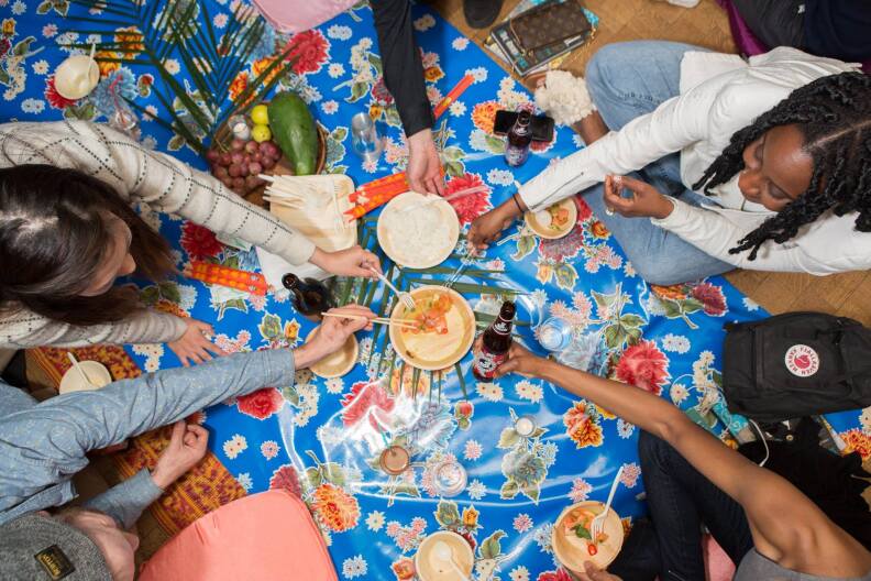People gathered around a table for the L.A. Food Book Fair 2017
